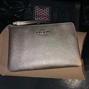 Gold coach wristlet